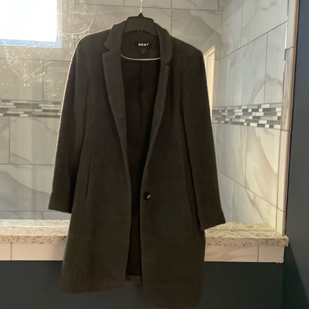 DKNY lined long coat. No tears or stains. 41% wool.